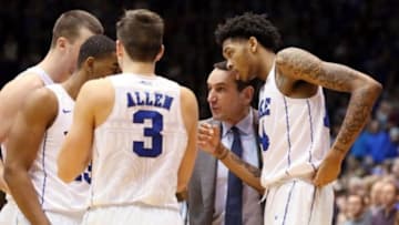 Jan 18, 2016; Durham, NC, USA; Duke Blue Devils head coach Mike Krzyzewski talks to his players in the closing seconds of their game against the Syracuse Orange at Cameron Indoor Stadium. Mandatory Credit: Mark Dolejs-USA TODAY Sports