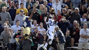Sep 19, 2015; South Bend, IN, USA; Georgia Tech Yellow Jackets defensive back D.J. White (28) intercepts the ball intended for Notre Dame Fighting Irish wide receiver Corey Robinson (88) in the second quarter at Notre Dame Stadium. Mandatory Credit: RVR Photos-USA TODAY Sports