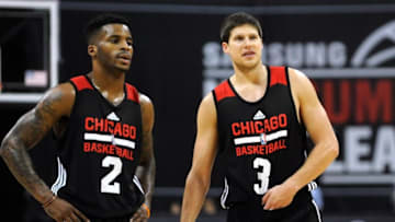 Jul 11, 2015; Las Vegas, NV, USA; Chicago Bulls guard Vander Blue (2) and forward Doug McDermott (3) talk during a free throw attempt during an NBA Summer League game against the Minnesota Timberwolves at Thomas & Mack Center. Mandatory Credit: Stephen R. Sylvanie-USA TODAY Sports