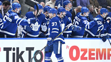 Apr 12, 2022; Toronto, Ontario, CAN; Toronto Maple Leafs defenseman Timothy Liljegren (37) celebrates with teammates after scoring against the Buffalo Sabres in the second period at Scotiabank Arena. Mandatory Credit: Dan Hamilton-USA TODAY Sports