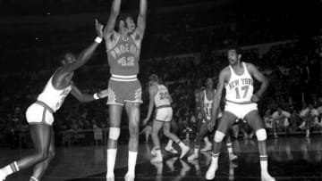 New York Knicks vs Phoenix Suns - Knicks' Cazzie Russell lets go with one-hander but Connie Hawkins of the Phoenix Suns goes up to grab it during action at the Garden last night. After eight years in NBA exile, Hawkins returned home to score 27 points but Knicks outshone the Suns, 140-116. (Photo By: Walter Kelleher/NY Daily News via Getty Images)