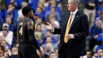 LEXINGTON, KY - JANUARY 13: Head coach Kim Anderson of the Missouri Tigers talks with Tramaine Isabell #4 during the game against the Kentucky Wildcats at Rupp Arena on January 13, 2015 in Lexington, Kentucky. Kentucky defeated Missouri 86-37. (Photo by Joe Robbins/Getty Images)