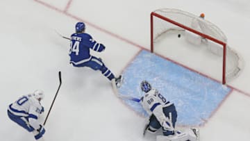 TORONTO, ON - MAY 10 : Auston Matthews #34 of the Toronto Maple Leafs scores the eventual winning goal against the Tampa Bay Lightning during Game Five of the First Round of the 2022 Stanley Cup Playoffs at Scotiabank Arena on May 10, 2022 in Toronto, Ontario, Canada. The Maple Leafs defeated the Lightning 4-3. (Photo by Claus Andersen/Getty images)