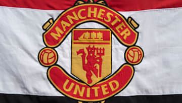 LEIGH, ENGLAND - APRIL 25: The Manchester United club badge on a banner the Barclays FA Women's Super League match between Manchester United Women and Tottenham Hotspur Women at Leigh Sports Village on April 25, 2021 in Leigh, England. Sporting stadiums around the UK remain under strict restrictions due to the Coronavirus Pandemic as Government social distancing laws prohibit fans inside venues resulting in games being played behind closed doors. (Photo by Visionhaus/Getty Images)