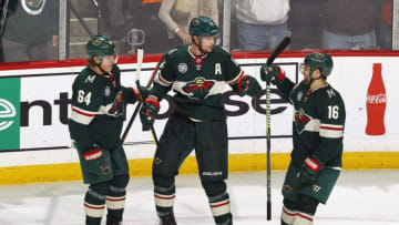 ST. PAUL, MN - NOVEMBER 15: Eric Staal #12 of the Minnesota Wild is congratulated by Mikael Granlund #64 of the Minnesota Wild and Jason Zucker #16 of the Minnesota Wild after scoring a 2nd period goal during a game with the Vancouver Canucks at Xcel Energy Center on November 15, 2018 in St. Paul, Minnesota.(Photo by Bruce Kluckhohn/NHLI via Getty Images)