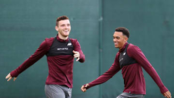 LIVERPOOL, ENGLAND - SEPTEMBER 17: Andy Robertson of Liverpool (L) and Trent Alexander-Arnold of Liverpool take part during a Liverpool training session at Melwood Training Ground on September 17, 2018 in Liverpool, England. (Photo by Mark Robinson/Getty Images)