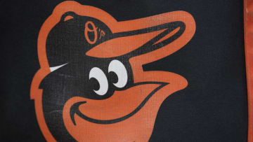 WASHINGTON, DC - APRIL 19: The Baltimore Orioles logo on a ball before a baseball game against the Washington Nationals at Nationals Park on April 19, 2023 in Washington, DC. (Photo by Mitchell Layton/Getty Images)