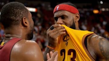 Dec 25, 2014; Miami, FL, USA; Cleveland Cavaliers forward LeBron James (23) talks to Miami Heat guard Dwyane Wade (3) after their game at American Airlines Arena. The Heat won 101-91. Mandatory Credit: Steve Mitchell-USA TODAY Sports
