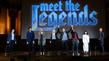 DC's Legends of Tomorrow -- "Meet the Legends" -- Image Number: LGN501b_0105b.jpg -- Pictured (L-R): Adam Beauchesne as Kevin Harris, Brandon Routh as Ray Palmer/Atom, Jes Macallan as Ava Sharpe, Caity Lotz as Sara Lance/White Canary, Nick Zano as Nate Heywood/Steel, Shayan Sobhian as Behrad, Ramona Young as Mona and Dominic Purcell as Mick Rory/Heatwave -- Photo: Jeff Weddell/The CW -- © 2020 The CW Network, LLC. All Rights Reserved.