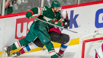 ST. PAUL, MN - MARCH 13: Nino Niederreiter #22 of the Minnesota Wild checks a member of the Colorado Avalanche during the game at the Xcel Energy Center on March 13, 2018 in St. Paul, Minnesota. (Photo by Bruce Kluckhohn/NHLI via Getty Images)