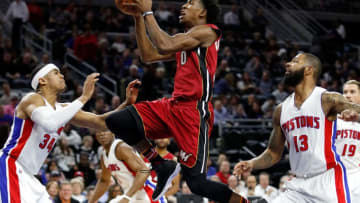 AUBURN HILLS, MI - MARCH 28: Josh Richardson #0 of the Miami Heat tries to get a shot off between Tobias Harris #34 and Marcus Morris #13 of the Detroit Pistons during the first half at the Palace of Auburn Hills on March 28, 2017 in Auburn Hills, Michigan. NOTE TO USER: User expressly acknowledges and agrees that, by downloading and or using this photograph, User is consenting to the terms and conditions of the Getty Images License Agreement. (Photo by Gregory Shamus/Getty Images)