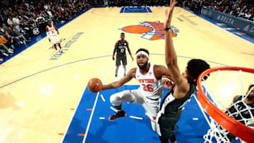 NEW YORK, NY - OCTOBER 29: Mitchell Robinson #26 of the New York Knicks shoots the ball against the Brooklyn Nets on October 29, 2018 at Madison Square Garden in New York City, New York. NOTE TO USER: User expressly acknowledges and agrees that, by downloading and or using this photograph, User is consenting to the terms and conditions of the Getty Images License Agreement. Mandatory Copyright Notice: Copyright 2018 NBAE (Photo by Nathaniel S. Butler/NBAE via Getty Images)