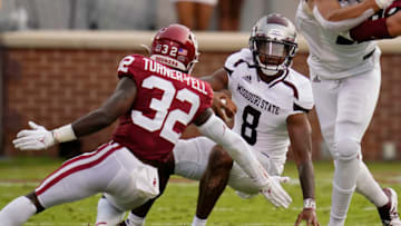 NORMAN, OK - SEPTEMBER 12: Oklahoma defensive back Delarrin Turner-Yell #32 moves in to tackle Missouri State quarterback Jaden Johnson #8 in the first half of an NCAA college football game on September 12, 2020, in Norman, Oklahoma. (Photo by Sue Ogrocki-Pool/Getty Images)