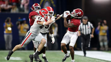 Dec 4, 2021; Atlanta, GA, USA; Alabama Crimson Tide wide receiver John Metchie III (8) catches a pass against the Georgia Bulldogs in the first half during the SEC championship game at Mercedes-Benz Stadium. Mandatory Credit: Brett Davis-USA TODAY Sports