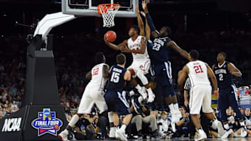 Apr 2, 2016; Houston, TX, USA; Oklahoma Sooners guard Buddy Hield (24) shoots against Villanova Wildcats forward Daniel Ochefu (23) in the first half in the 2016 NCAA Men