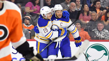 Apr 1, 2023; Philadelphia, Pennsylvania, USA; Buffalo Sabres right wing Kyle Okposo (21) celebrates his goal with center Peyton Krebs (19) against the Philadelphia Flyers during the first period at Wells Fargo Center. Mandatory Credit: Eric Hartline-USA TODAY Sports