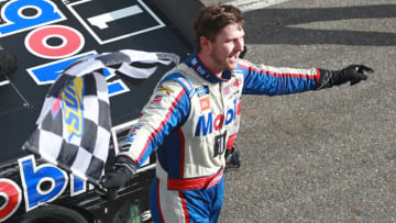 MARTINSVILLE, VIRGINIA - OCTOBER 26: Todd Gilliland, driver of the #4 Mobil 1 Toyota, celebrates after winning the NASCAR Gander Outdoor Truck Series NASCAR Hall of Fame 200 at Martinsville Speedway on October 26, 2019 in Martinsville, Virginia. (Photo by Matt Sullivan/Getty Images)