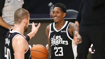 LOS ANGELES, CALIFORNIA - FEBRUARY 07: Lou Williams #23 and Ivica Zubac #40 celebrate a call against the Sacramento Kings of the LA Clippers at Staples Center on February 07, 2021 in Los Angeles, California. NOTE TO USER: User expressly acknowledges and agrees that, by downloading and or using this photograph, User is consenting to the terms and conditions of the Getty Images License Agreement. (Photo by Meg Oliphant/Getty Images)