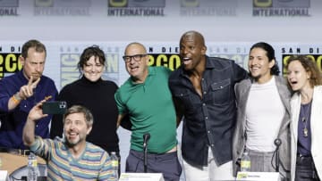 SAN DIEGO, CALIFORNIA - JULY 22: (L-R) Scott M. Gimple, Chris Hardwick, Channing Powell, Michael E. Satrazemis, Terry Crews, Danny Ramirez, and Samantha Morton pose for a selfie photo onstage at AMC's "Tales of the Walking Dead" panel during 2022 Comic-Con International: San Diego at San Diego Convention Center on July 22, 2022 in San Diego, California. (Photo by Kevin Winter/Getty Images)
