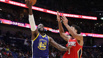 NEW ORLEANS, LOUISIANA - OCTOBER 28: Draymond Green #23 of the Golden State Warriors makes a shot over Jahlil Okafor #8 of the New Orleans Pelicans at Smoothie King Center on October 28, 2019 in New Orleans, Louisiana. NOTE TO USER: User expressly acknowledges and agrees that, by downloading and/or using this photograph, user is consenting to the terms and conditions of the Getty Images License Agreement (Photo by Chris Graythen/Getty Images)