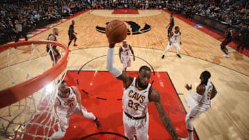 TORONTO, CANADA - JANUARY 11: LeBron James #23 of the Cleveland Cavaliers grabs the rebound against the Toronto Raptors on January 11, 2018 at the Air Canada Centre in Toronto, Ontario, Canada. NOTE TO USER: User expressly acknowledges and agrees that, by downloading and/or using this photograph, user is consenting to the terms and conditions of the Getty Images License Agreement. Mandatory Copyright Notice: Copyright 2018 NBAE (Photo by Ron Turenne/NBAE via Getty Images)