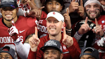 ARLINGTON, TX - DECEMBER 02: Head coach Lincoln Riley of the Oklahoma Sooners celebrates the Big 12 Championship after defeating the TCU Horned Frogs 41-17 at AT&T Stadium on December 2, 2017 in Arlington, Texas. (Photo by Ronald Martinez/Getty Images)