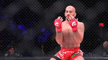Nov 3, 2017; University Park, PA, USA; Saad Awad (red gloves) raises his hands after knocking out Zach Freeman (not pictured) during Bellator 186 at Bryce Jordan Center. Mandatory Credit: Matthew O'Haren-USA TODAY Sports