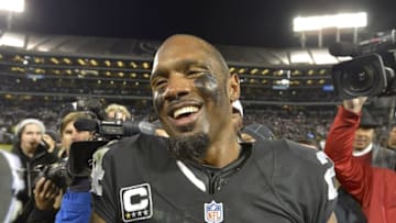 Dec 24, 2015; Oakland, CA, USA; Oakland Raiders free safety Charles Woodson (24) reacts after playing his final home game during an NFL football game against the San Diego Chargers at O.co Coliseum. The Raiders defeated the Chargers 23-20 in overtime. Mandatory Credit: Kirby Lee-USA TODAY Sports