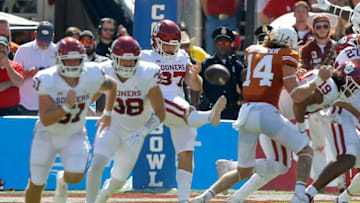 OU's Michael Turk (37) punts the ball during a 55-48 win against Texas on Oct. 9 in Dallas.turk