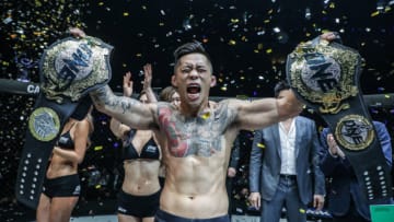 MANILA, PHILIPPINES - NOVEMBER 10: Martin Nguyen becomes the first-ever dual-division World Champion in ONE Championship history during ONE Championship: Legends of the World at the Mall of Asia Arena on November 10, 2017 in Manila, Philippines. (Photo by Dux Carvajal/ONE Championship/Getty Images)