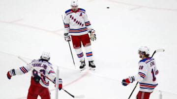 SAN JOSE, CALIFORNIA - DECEMBER 12: Chris Kreider #20 and Marc Staal #18 celebrate with Mika Zibanejad #93 of the New York Rangers after Zibanejad scored a goal against the San Jose Sharks at SAP Center on December 12, 2019 in San Jose, California. (Photo by Ezra Shaw/Getty Images)