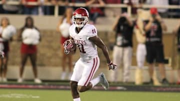Oct 22, 2016; Lubbock, TX, USA; Oklahoma Sooners wide receiver Dede Westbrook (11) rushes against the Texas Tech Red Raiders in the first quarter at Jones AT&T Stadium. Mandatory Credit: Michael C. Johnson-USA TODAY Sports