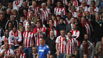 SOUTHAMPTON, ENGLAND - APRIL 07: Southampton fans voice their opinions towards Scott Allan of Portsmouth as he prepares to take a corner during the npower Championship match between Southampton and Portsmouth at St Mary's Stadium on April 7, 2012 in Southampton, England. (Photo by Michael Steele/Getty Images)