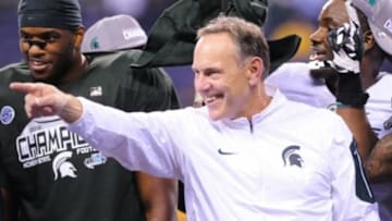 Dec 5, 2015; Indianapolis, IN, USA; Michigan State Spartans head coach Mark Dantonio celebrates after the game against the Iowa Hawkeyes in the Big Ten Conference football championship game at Lucas Oil Stadium. Michigan State won 16-13. Mandatory Credit: Thomas J. Russo-USA TODAY Sports