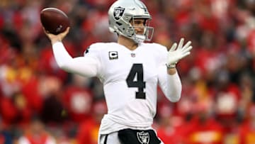 KANSAS CITY, MISSOURI - DECEMBER 30: Quarterback Derek Carr #4 of the Oakland Raiders in action during the game against the Kansas City Chiefs at Arrowhead Stadium on December 30, 2018 in Kansas City, Missouri. (Photo by Jamie Squire/Getty Images)