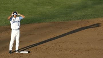OMAHA, NE - JUNE 21: Leftfielder Reid Fronk #7 of the North Carolina Tar Heels adjusts his helmet after hitting a double in the sixth inning of their 7-4 win over the Rice Owls in Game 13 of the NCAA College World Series at Rosenblatt Stadium on June 21, 2007 in Omaha, Nebraska. (Photo by Kevin C. Cox/Getty Images)