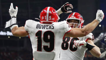 Brock Bowers celebrates his touchdown against the Alabama Crimson Tide with teammate John FitzPatrick. (Photo by Todd Kirkland/Getty Images)