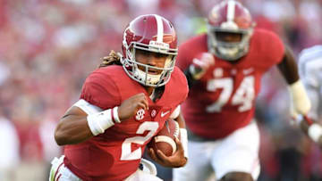 Oct 22, 2016; Tuscaloosa, AL, USA; Alabama Crimson Tide quarterback Jalen Hurts (2) carries the ball up the field against the Texas A&M Aggies during the third quarter at Bryant-Denny Stadium. Mandatory Credit: John David Mercer-USA TODAY Sports