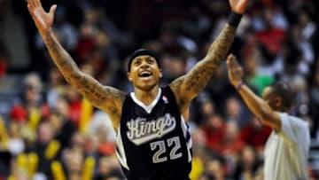 Mar 15, 2014; Chicago, IL, USA; Sacramento Kings guard Isaiah Thomas (22) reacts after scoring against the Chicago Bulls at the United Center. The Bulls won 94-87. Mandatory Credit: Matt Marton-USA TODAY Sports