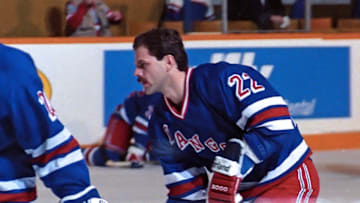 TORONTO, ON - MARCH 14: Mike Gartner #22 of the New York Rangers skates against the Toronto Maple Leafs during NHL game action March 14, 1990 at Maple Leaf Gardens in Toronto, Ontario, Canada. New York defeated Toronto 8-2. (Photo by Graig Abel/Getty Images)