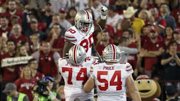 Sep 17, 2016; Norman, OK, USA; Ohio State Buckeyes wide receiver Noah Brown (80) celebrates with offensive lineman Jamarco Jones (74) and offensive lineman Billy Price (54) after scoring a touchdown against the Oklahoma Sooners during the first half at Gaylord Family - Oklahoma Memorial Stadium. Mandatory Credit: Kevin Jairaj-USA TODAY Sports