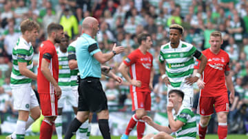 GLASGOW, SCOTLAND - MAY 27: Kieran Tierney of Celtic sits on the turf with a facial injury that forced him to be substituted in the first half during the William Hill Scottish Cup Final between Aberdeen and Celtic at Hampden Park on May 27, 2017 in Glasgow, Scotland. (Photo by Mark Runnacles/Getty Images)