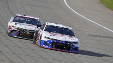 Kyle Larson, Hendrick Motorsports, and Denny Hamlin, Joe Gibbs Racing, NASCAR (Photo by Logan Riely/Getty Images)