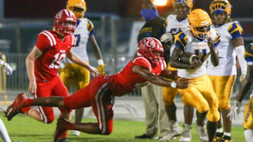 Auburn footballMarcus Patterson tries to make a diving tackle on Rickards Keyon Brown during the Crestview Rickards football game at Crestview.Crestview Rickards Football