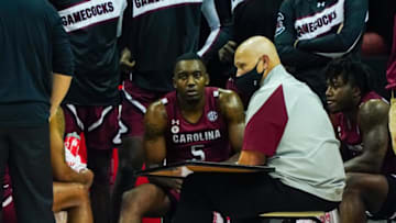 Nov 28, 2020; Kansas City, Missouri, USA; South Carolina Gamecocks head coach Frank Martin talks to players during a timeout in the second half against the Liberty Flames at T-Mobile Center. Mandatory Credit: Jay Biggerstaff-USA TODAY Sports