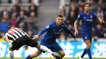 NEWCASTLE UPON TYNE, ENGLAND - AUGUST 26: Mateo Kovacic of Chelsea is challenged by Deandre Yedlin of Newcastle United during the Premier League match between Newcastle United and Chelsea FC at St. James Park on August 26, 2018 in Newcastle upon Tyne, United Kingdom. (Photo by Stu Forster/Getty Images)