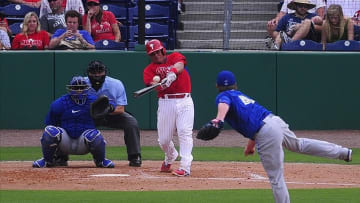 Feb 26, 2014; Clearwater, FL, USA; Philadelphia Phillies catcher Carlos Ruiz (51) bats against Toronto Blue Jays starting pitcher Kyle Drabek (4) in a spring training exhibition game at Bright House Field. Mandatory Credit: David Manning-USA TODAY Sports