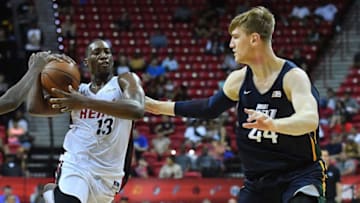 LAS VEGAS, NV - JULY 10: Bam Adebayo #13 of the Miami Heat drives against Isaac Haas #44 of the Utah Jazz during the 2018 NBA Summer League at the Thomas & Mack Center on July 10, 2018 in Las Vegas, Nevada. (Photo by Sam Wasson/Getty Images)