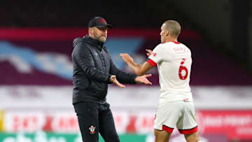 BURNLEY, ENGLAND - SEPTEMBER 26: Ralph Hasenhuttl, Manager of Southampton and Oriol Romeu of Southampton celebrate following their sides victory in the Premier League match between Burnley and Southampton at Turf Moor on September 26, 2020 in Burnley, England. Sporting stadiums around the UK remain under strict restrictions due to the Coronavirus Pandemic as Government social distancing laws prohibit fans inside venues resulting in games being played behind closed doors. (Photo by Alex Livesey/Getty Images)