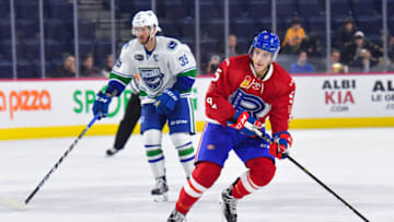 LAVAL, QC - JANUARY 10: Laval Rocket defenceman Tom Parisi (5) skates in control of the puck during the Utica Comets versus the Laval Rocket game on January 10, 2018, at Place Bell in Laval, QC (Photo by David Kirouac/Icon Sportswire via Getty Images)